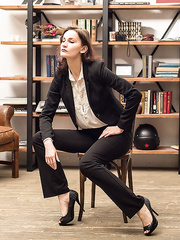 Elegant girl tied to the chair