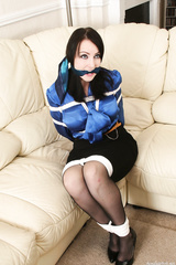 Jessica Woods tied and gagged on sofa