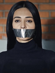 ‪Cansu Melis Karakus tape gagged