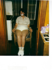 Tied  in a chair