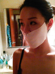 Asian gagged woman