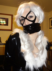 Black cat gagged