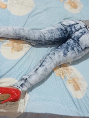 sleepy asian given footjob in tight jeans
