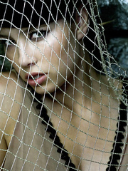 Jessica Biel Caught in a Net