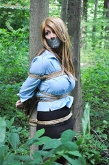 Madie Taylor tied in the forest 2