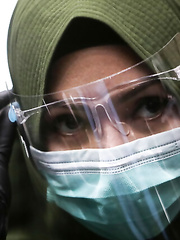 Girl Wearing Mask and Latex Gloves