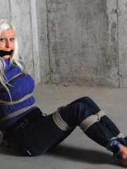 Tied in basement wearing jeans