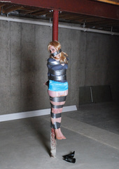 Blonde Girl Taped to a poll