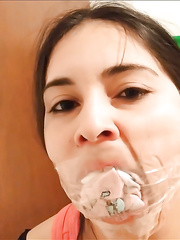 Sexy Girl Gagged With Six Socks And Clear Tape By MILF
