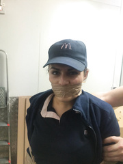 female employee wrap gagged and bound