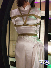 Girls tied in shiny clothes