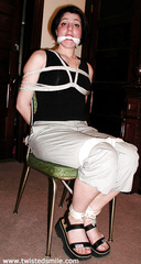 Tied To A Chair In Sandals