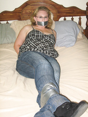Girlfriend taped on bed