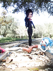 Tied to the railroad tracks
