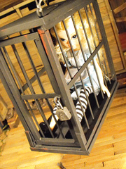 Alice in a cage