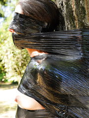 Isa mummified standing to a tree