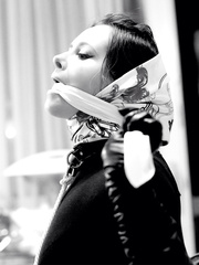 Selfgagged women with Headscarf