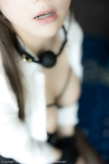 Asian ball gagged