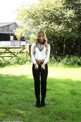 Adora in prison belt annoyed!