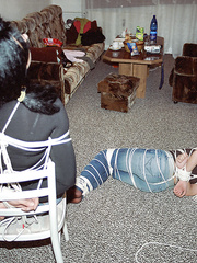 More roped and taped up girls