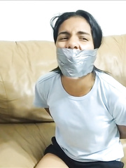 Panty Hooded Girl Gagged With Socks And Tape