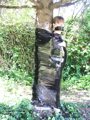 Wendy wrapped to a tree
