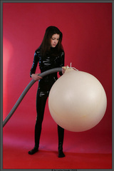 Black Catsuit Model in Giant Balloon