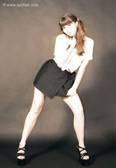 Rosaleen Young in white blouse and black skirt