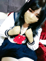 Cosplayer  girl tape over nose gagged
