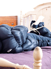 hogtied and hooded in down jackets