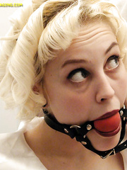Blonde tied and ball gagged