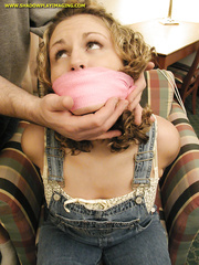 Bound and gagged in overalls and converse sneakers
