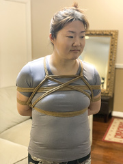 Sarah in Shibari Takate Kote