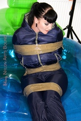 Woman tape bound rainwear