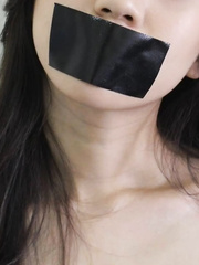 Pretty Asian mouth taped
