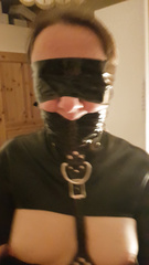 Latex Straitjacket and Tape gagged
