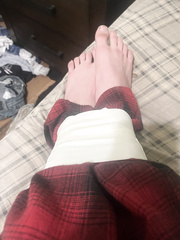 Femboy feet tied in microfoam tape