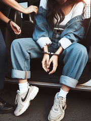 Arrested and handcuffed women